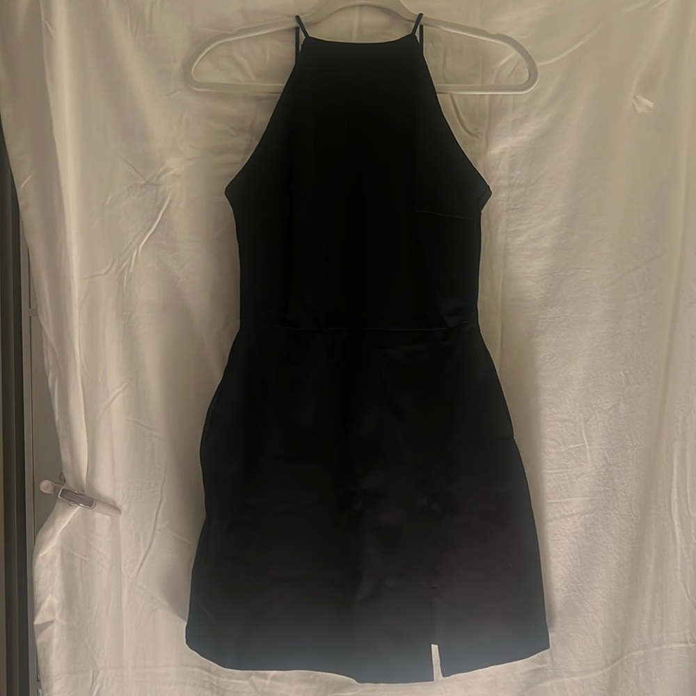 Black dress with straps and small slit on the side